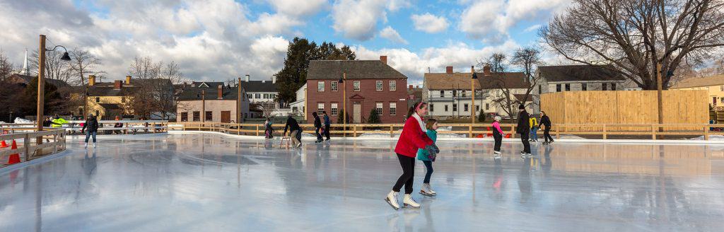 Cover image of skaters on Puddle Dock Pond